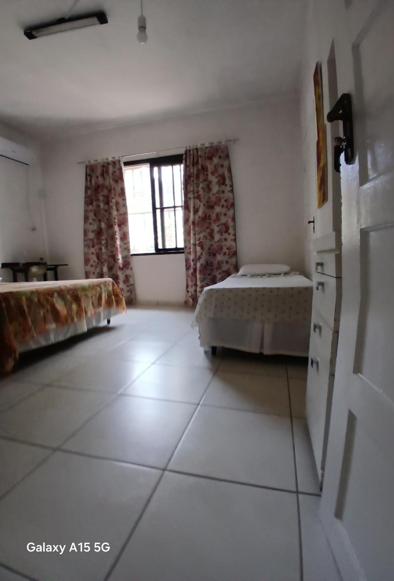 Quarto Família com Banheiro Compartilhado